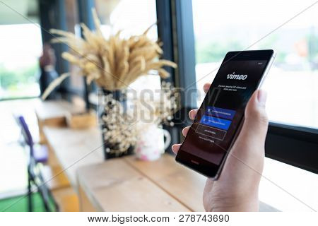 Chiang Mai, Thailand - Sep. 08,2018: Man Holding Huawei With Vimeo On Screen.  Vimeo Is A Video-shar