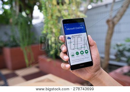 Chiang Mai, Thailand - August 05,2018: Man Holding Huawei With Onedrive On Screen. Microsoft Onedriv