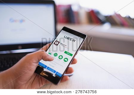 Chiang Mai, Thailand - June 03,2018: Man Holding Huawei With Uber Apps. Uber Is Smartphone App Trans
