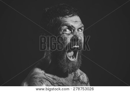 Hipster With Beard, Mustache Shout With Horror On Black Background. Bearded Man With Tattoo On Chest