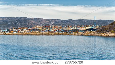 Greenland view of Ilulissat City and icefjord. Tourist destination in the actic.
