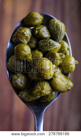 Edible Capers In Spoon Ready To Eat.