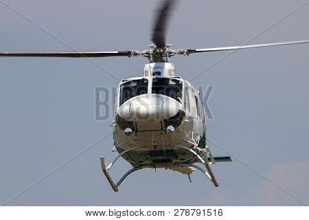 Ahlen, Germany - Jun 5, 2016: Close Up Of A White Bell 412sp Helicopter Landing.