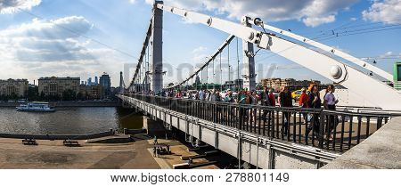 Russia, Moscow - May 13, 2018 People Walkin On Krymsky Bridge