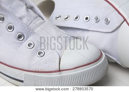 White Laceless Sneakers