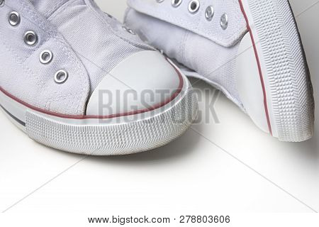 White Laceless Sneakers