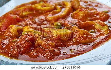 Koonthal Kulambu, Squid In Roasted Coconut Gravy Is Cooked , Kerala Style Cuisine, Traditional Assor