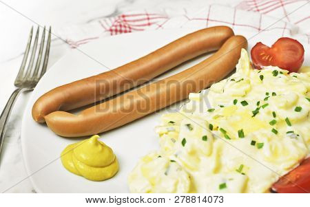 Delicious Potato Salad With Mayonnaise, Sausages And Mustard. German Cuisine, Christmas Meal Or Bava