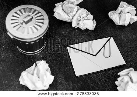 Envelope With Clip Symbol Of Email And Attachments With Trash Can Next To It