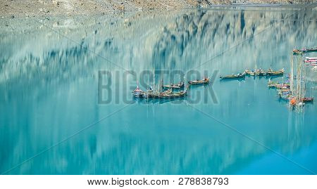 Docked Boats In The Attabad Lake. Gojal Hunza. Gilgit Baltistan, Pakistan.