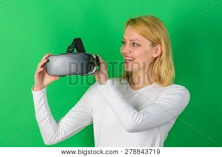 Amazed Young Woman Touching The Air During The Vr Experience. Young Woman Using A Virtual Reality He