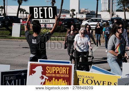 Houston, Texas - November 2, 2018: A Volunteer Holding Beto For Senate Sign Outside Voting Station I