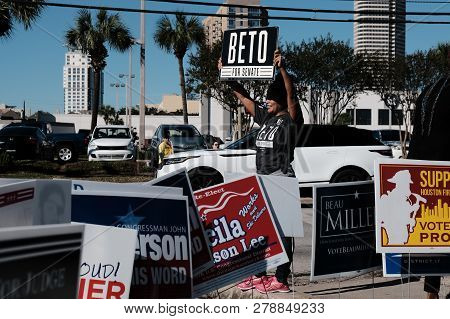 Houston, Texas - November 2, 2018: A Volunteer Holding Beto For Senate Sign Outside Voting Station I