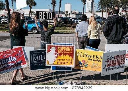 Houston, Texas - November 2, 2018: A Volunteer Holding Beto For Senate Sign Outside Voting Station I