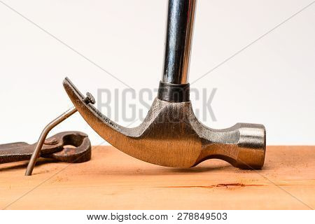 Vintage Hammer Nail Puller Pull Bent Big Nail Out Of The Board, With Vintage Grungy Forged Pincers.