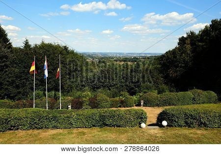 Flags From Netherlands, Belgium And Germany On Three Country Border