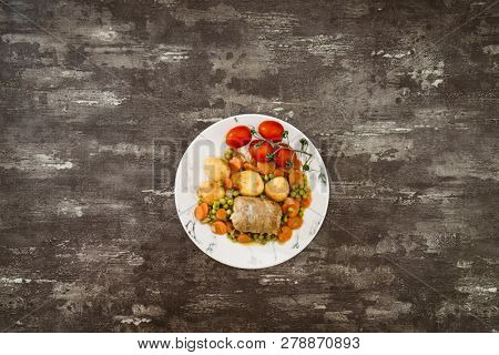 Beef meat stewed with potatoes-Traditional French cuisine Beef Bourguignon potatoes carrots in persillade