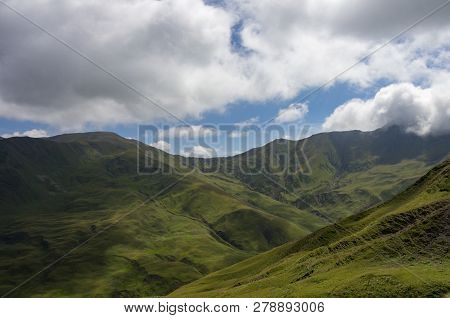 Serpentine Road. Panorama Of Mountain Valley From Top Of Datvisjvari  Pass, Georgia, Europe