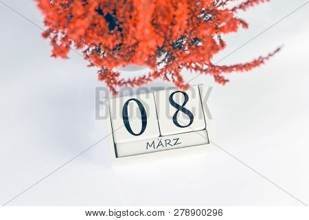 Flowers Of Orange Calluna Vulgaris With Cube Calendar On White Background, Isolated, Copy Space For 