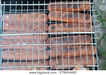 Preparation On Bbq. Dish With Roasted Meat On Abstract Background. Hot Tasty Smokey Barbecue Meal At