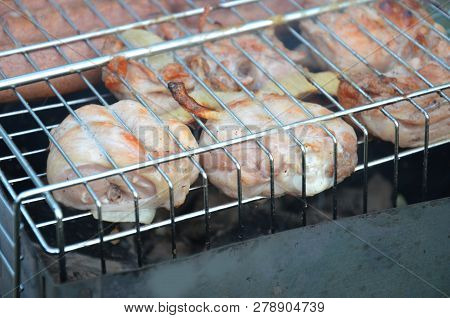 Preparation On Bbq. Dish With Roasted Meat On Abstract Background. Hot Tasty Smokey Barbecue Meal At