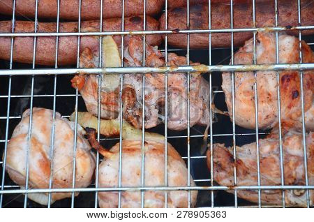 Preparation On Bbq. Dish With Roasted Meat On Abstract Background. Hot Tasty Smokey Barbecue Meal At