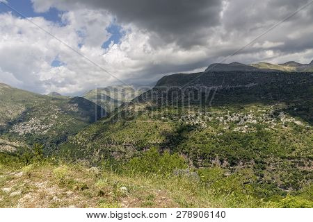 View Of The Traditional, Greek Village Kalarites Which Is On The Mountain Baros At An Altitude Of 12