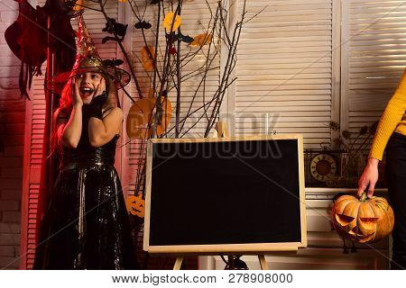 Little Girl Happy Smile On Halloween. Happy Little Girl Enjoy Halloween Party. Happy As A Witch In A