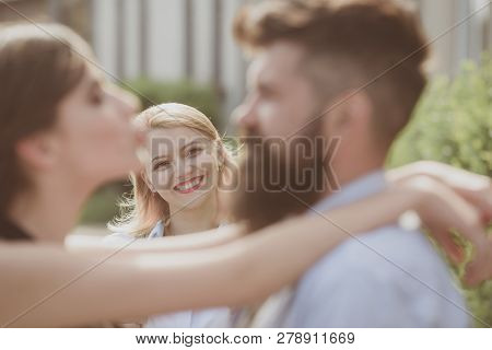 She Is Not Jealous. Bearded Man Cheating His Girlfriend With Another Woman. Romantic Couple Of Man A
