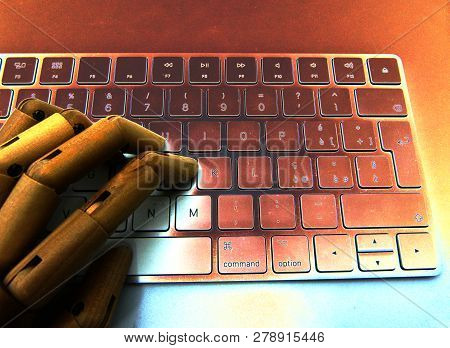 Wooden Hand On Burning Keyboard Computer, The Day After