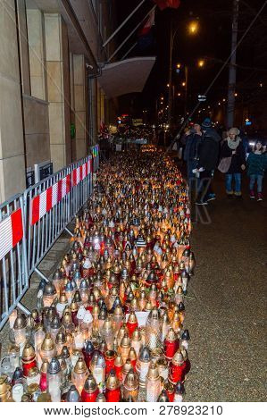 Gdansk, Poland - January 16, 2019:  Several Thousand Candles At City Hall Of Gdansk At Night. Commem