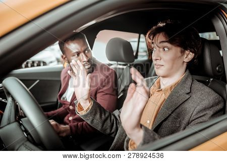 Student Being Inattentive And Not Listening To His Driving Teacher