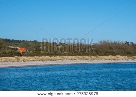 The Beach In Town Of Klintholm In Denmark