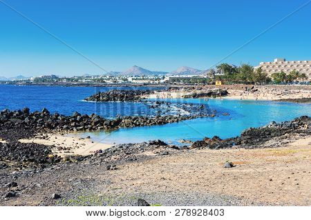 Lagoon With Turquoise Clear Water In Playa Jablillo Beach, In Costa Teguise, Lanzarote, Canary Islan