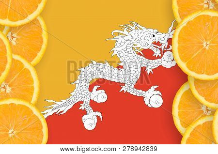Bhutan Flag  In Citrus Fruit Slices Vertical Frame