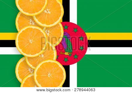 Dominica Flag And Citrus Fruit Slices Vertical Row