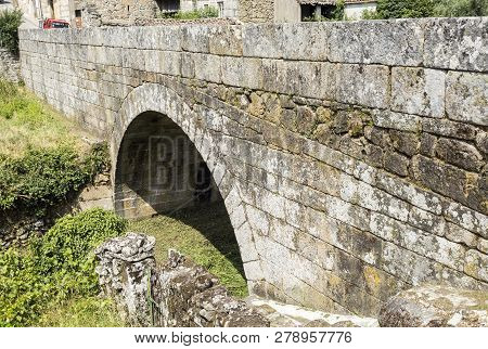 View Of The Medieval Bridge In Granite Masonry Of Village Of Matanca, Fornos De Algodres, Portugal