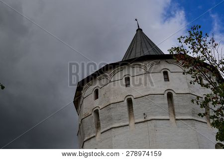 View Of The Fortress Tower. Novospassky Stavropigial Monastery. Moscow City. Dark Rainy Sky