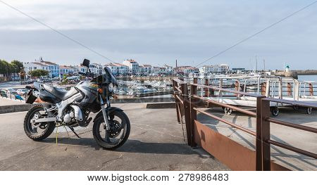 Motorcycle Parked In Harbor Port Joinville On Yeu Island