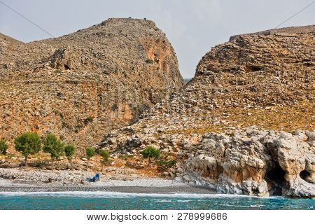 View From The Sea On Marmara Beach And Entrance To Aradena Gorge, South-west Coast Of Crete Island, 