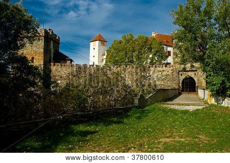 Entrance gate with a drawbridge into the castle Bï¿½tov.