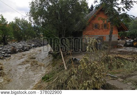 Building In A Flooded Area After Heavy Rainfalls, Muddy Water