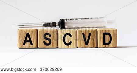 Text Ascvd Made From Wooden Cubes. White Background