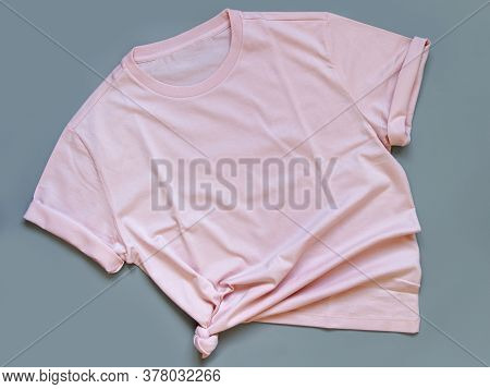 Pink T-shirt Mock Up Flat Lay On Grey Background Top View