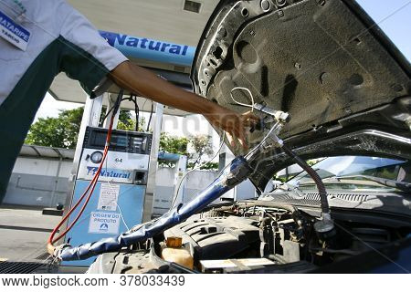 Salvador, Bahia / Brazil - December 6, 2016: Vehicle Is Seen During Filling With Vehicular Natural G