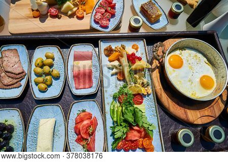 A Delicious Breakfast Meal For Eating In The Table