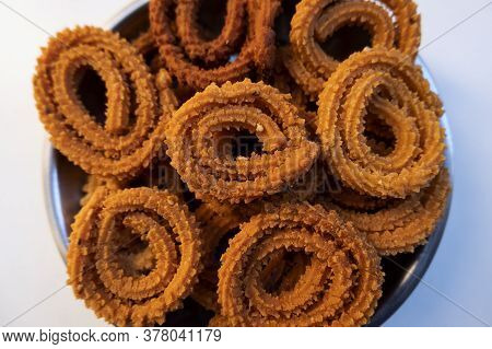 A Closeup View Of Indian Homemade Round Snacks Group On White Background