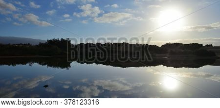 Sunrise From The Lagoon With Reflections In The Water, Charca De Maspalomas, South Of Gran Canaria,
