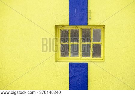 Yellow And Blue Strip Wall And Window Close Up