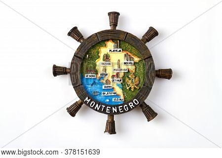 Montenegro Tourist Souvenir In A Shape Of Boat Steering Wheel. Isolated On White Background.